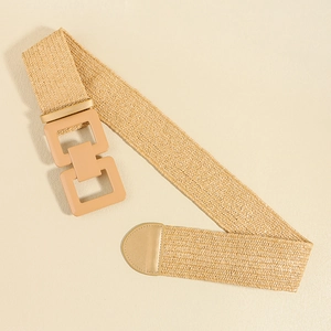 Bohemian beige woven waist belt with a square resin buckle and flexible straw texture