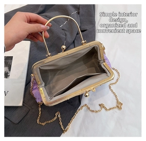 Top view of a purple sequin mesh evening bag showing interior pocket and chain strap