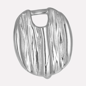 Macro detail of silver metal pendant with irregular vertical textures and top ring