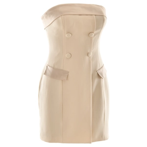 Detailed view of beige strapless dress with double-breasted buttons and flap pockets