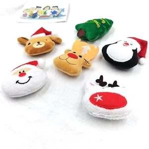Detailed view of 6-piece Christmas plush brooch set featuring reindeer and snowman figures