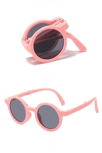 Pink foldable round children sunglasses showing front and side views in detail