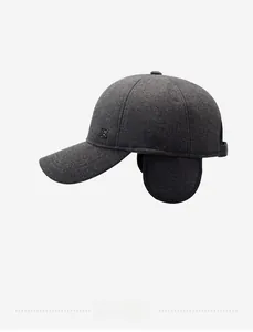 Side view of men's winter wool baseball cap with ear flaps and metallic detail