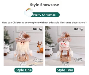 Detailed view of Santa and snowman Christmas candy jars with sequins and clear bases