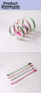 Detail view showing four patterns of printed pet collars with colorful buckles and D-rings