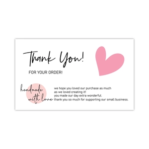 Detail of pink hearts thank you card for small business orders with handmade love seal