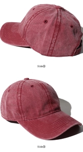 Side view detail of vintage washed cotton baseball cap in burgundy showing texture