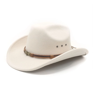 Ethnic white cowboy hat with braided brown band and vintage metal star emblems