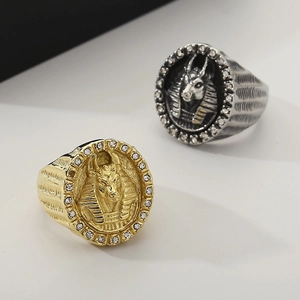 Detailed view of Egyptian Anubis rings in gold and silver finish with zircon inlay