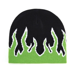 Black knitted beanie hat with green and white flame jacquard pattern in street style