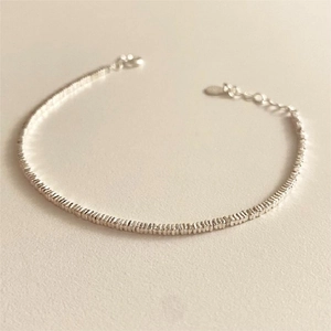 Detail of S925 sterling silver beaded bracelet with lobster clasp and extension chain