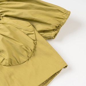 Mustard yellow slim-fit halter top for women with puff sleeves and pleated chest design