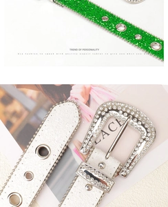 Detail of green and white glitter belts featuring rhinestone buckles and metal eyelets