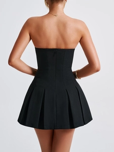Back view of black strapless pleated dress with a functional center zipper closure