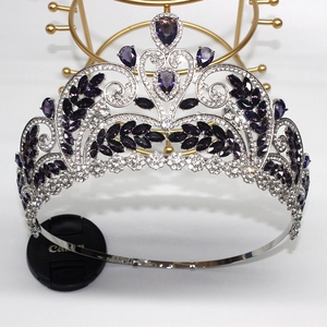 Detail of silver bridal crown with purple teardrop gems and sparkling clear zircons