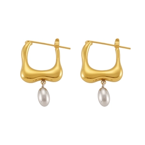Polished two-tone oval drop earrings in minimalist 18k gold and silver geometric style