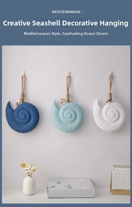 Mediterranean style conch wall hanging detail view, showing exquisite texture and hemp rope.