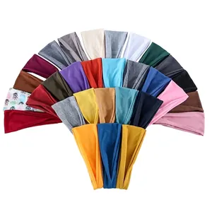 Elastic solid color and pineapple print yoga sports headbands displayed in multiple colors