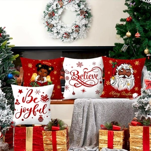 Set of four Christmas pillow covers with Santa and angel prints for festive sofa decor