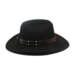 Detail of vintage wool felt fedora with brown leather band and turquoise studs