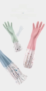 Detail of waterproof PVC household gloves with fleece lining and Nordic floral printed cuffs
