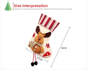 Detail view of 30x17cm Christmas stocking featuring a 3D reindeer doll and dimensions