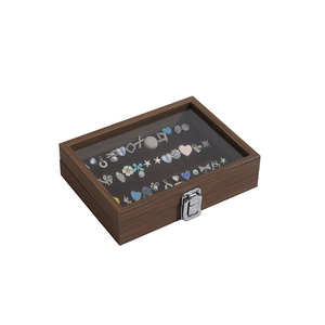 Walnut wood jewelry box with glass lid and black velvet lining for ring storage