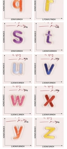 Detailed grid of colorful embroidered alphabet patches from Q to Z with dimensions