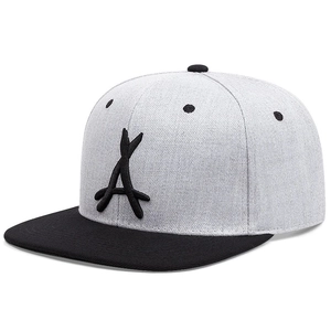 Detail of gray snapback cap with black embroidered A logo and flat brim structure