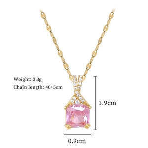 Detail showing pink square gemstone pendant with crystal inlay on a gold steel chain