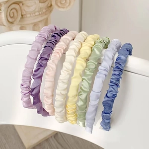 Set of pleated satin headbands in 8 pastel colors for women including blue, pink and yellow
