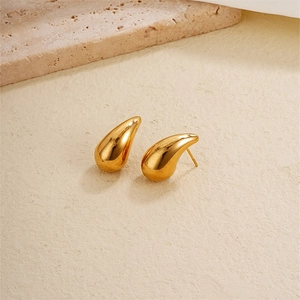 Polished golden teardrop earrings with a minimalist water drop design for women