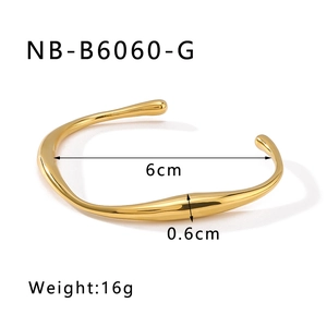 Detailed view of irregular 18K gold plated stainless steel bangle with dimensions