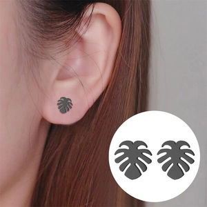 Minimalist black monstera leaf stud earrings with a matte finish for a stylish look