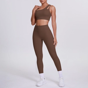 Detail view of coffee brown one-shoulder sports bra and high-waisted yoga leggings set