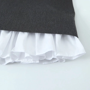 Women's chic grey casual dress featuring white layered ruffle hem stitching details