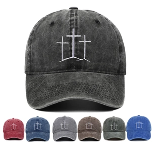 Detailed view of triple cross embroidery on vintage washed cotton baseball caps
