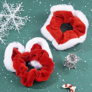 Red velvet Christmas scrunchies with white plush trim and sparkling sequins decoration
