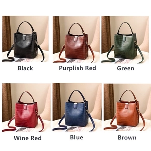Chic faux crocodile texture bucket bag shown in six vibrant colors for women