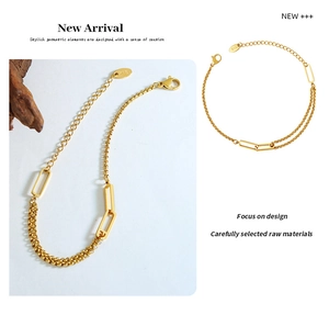 Close-up of geometric hollow rectangle chain bracelet with 18K gold K18 stamp