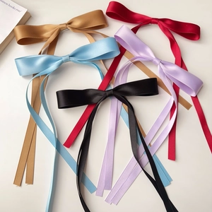 Five satin bow hair clips with long ribbons in gold, blue, black, purple and red colors