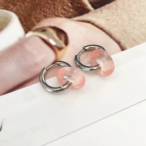 Close-up of pink natural stone texture ring earring with 18k gold plated stainless steel