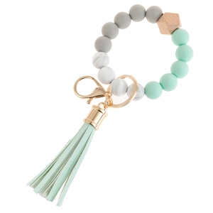 Silicone bead bangle keychain with mint green tassel and natural wood bead accent