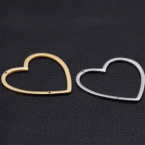 Gold and silver heart-shaped stainless steel pendant frames with double holes for DIY jewelry