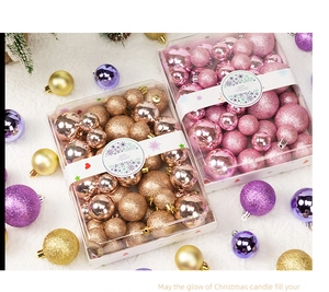 Detail of rose gold Christmas ball ornaments set with matte and glitter finishes