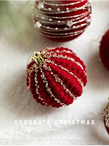 Detail of 8cm burgundy flocked Christmas ball with gold beads and sequin floral patterns