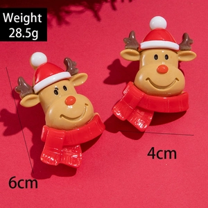 Détails de boucles d'oreilles renne en résine dimensions 6cm par 4cm et poids 28,5g