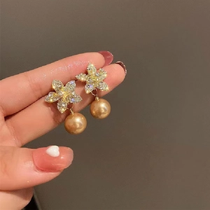 Exquisite gold floral earrings with hanging pearls and crystal accents for women