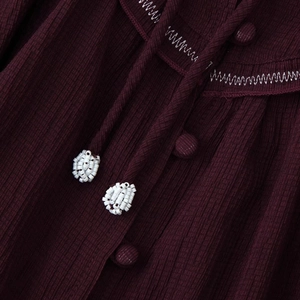 Ethnic style dark burgundy linen shirt with vertical texture and white beaded tassel ties