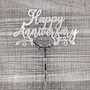 Silver mirror acrylic cake topper with Happy Anniversary text and floral scrolls